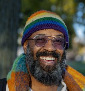 Photo of a man, Melik, smiling.